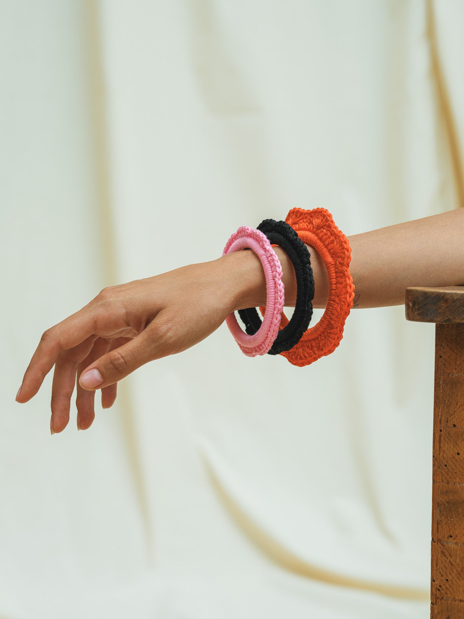 Front view of hand crocheted scallop bracelets.